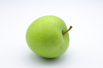 One green apple. Close up and isolated.