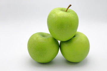 Green apples. Close up and isolated.
