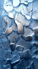 Abstract close-up of textured ice with illuminated reflections, showcasing unique patterns and shapes, perfect for backgrounds and designs.