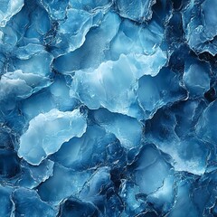 A close-up of ice textures in various shades of blue, showcasing natural patterns and fine details that create a cool and refreshing atmosphere.