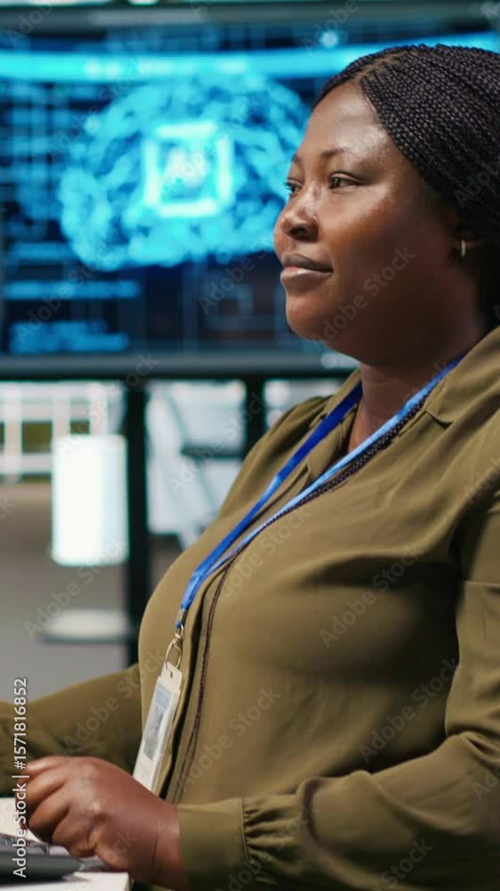 Fototapete vertical video female technician writing code on pc, developing neural networks apis. system adminis