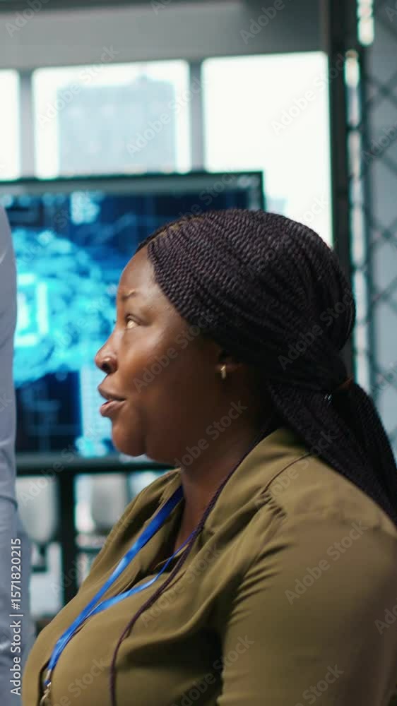 Poster vertical video pleased startup office manager applauding female programmer for optimizing code using