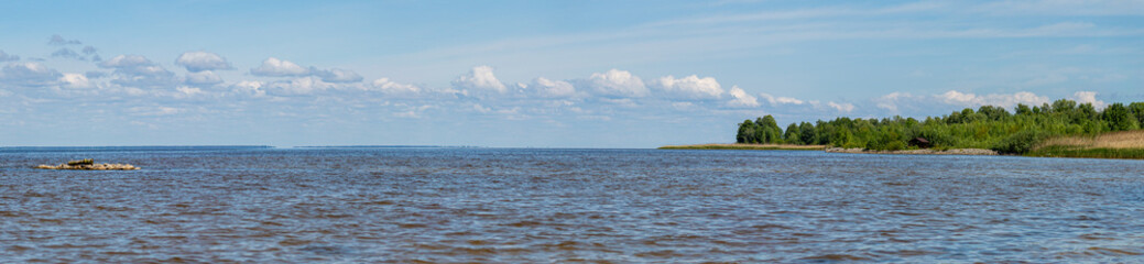 The spring landscapes on the Kiev Sea showcase blooming nature, calm waters, and a refreshing...