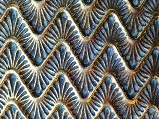 Elegant blue and gold shell pattern creating a beautiful textured background