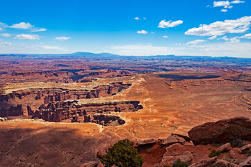 Canyonlands iin the State of Utah is  a wilderness of countless canyons and fantastically formed buttes carved by the Colorado River