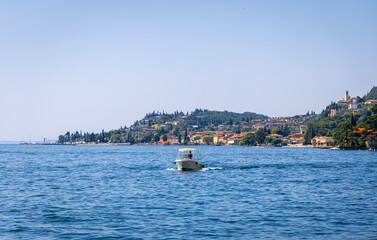 View of Gargnano signpost by Lake Garda, Italy; ideal for travel and destination visuals.