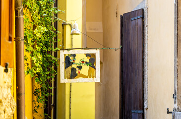 View of Gargnano signpost by Lake Garda, Italy; ideal for travel and destination visuals.