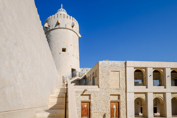 The round stone watchtower at the 18th century White Fort of Qasr al Hosn in the center of the...
