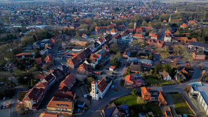 Aerial view around the old town of the city Zeven on a sunny autumn noon in Germany.	