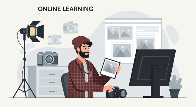 Photographer Learning Online In A Creative Studio Workspace Revising Images