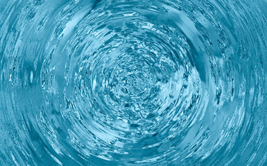 Vortex of swirling clear water with reflections and turbulence captured in a top-down motion blur...