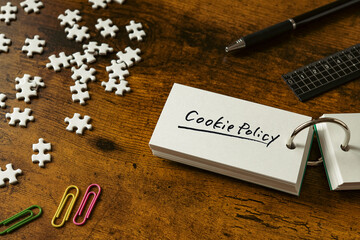 There is word card with the word Cookie Policy. It is as an eye-catching image.