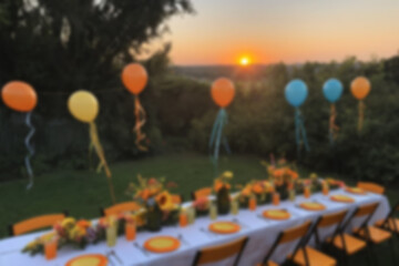 Obraz premium blurry photo of dining area for party neatly lined up on outdoor theme page