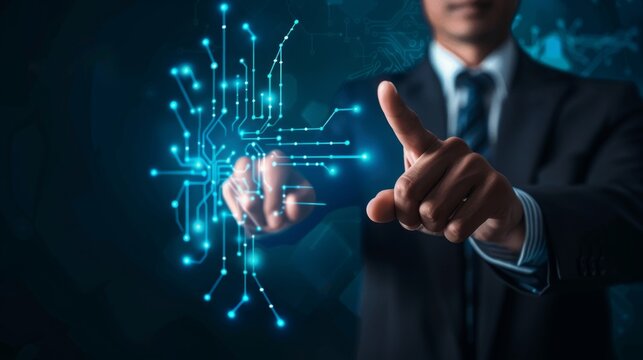 A businessman in a suit interacts with a glowing digital circuit interface, symbolizing technology and innovation in a futuristic setting.