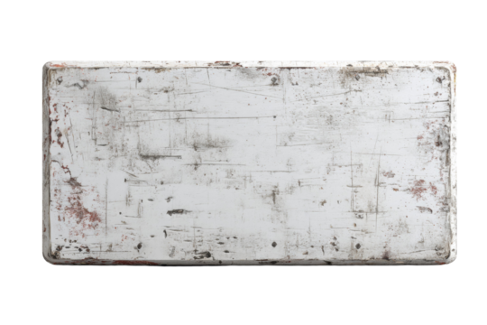 A white board with a lot of scratches and marks on it