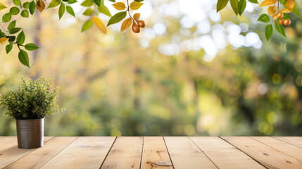 A potted plant sits on a wooden table in front of a tree