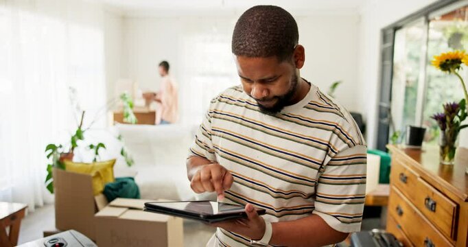 Couple, moving and man with tablet in home for furniture checklist, organize boxes or relocation. Mortgage investment, black people or digital app for inventory planning, packing items or immigration