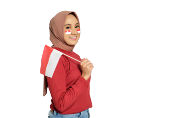 Happy young Asian women celebrate Indonesian independence day on 17 August by holding the Indonesian flag isolated on transparent background