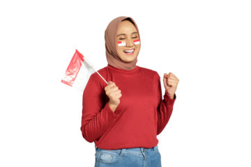 Excited young Asian women celebrate Indonesian independence day on 17 August by holding the Indonesian flag isolated on transparent background