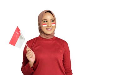 Happy young Asian women celebrate Indonesian independence day on 17 August by holding the Indonesian flag isolated on transparent background