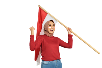 Excited young Asian women celebrate Indonesian independence day on 17 August by holding the Indonesian flag isolated on transparent background