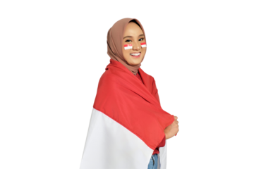Happy young Asian women celebrate Indonesian independence day on 17 August with the Indonesian flag isolated on transparent background