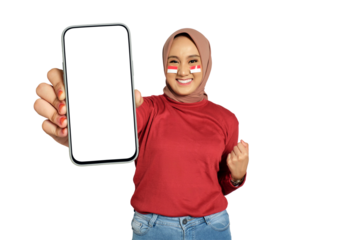 Excited young Asian women celebrate Indonesian independence day on 17 August while holding smartphone with blank screen isolated on transparent background