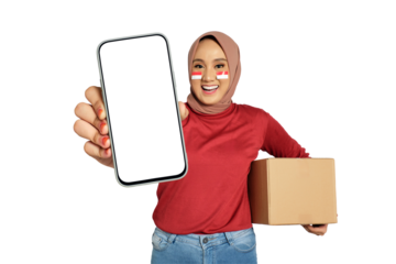 Happy young Asian women celebrate Indonesian independence day on 17 August while holding smartphone with blank screen and cardboard boxes isolated on transparent background