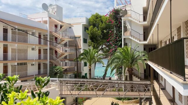 Palma de Majorca, Spain - July 7, 2025: Santa Ponsa tourist resort. View showing hotels along Santa Ponsa coastline. Architectural buildings on Balearic Island. Apartments, Houses on the coast