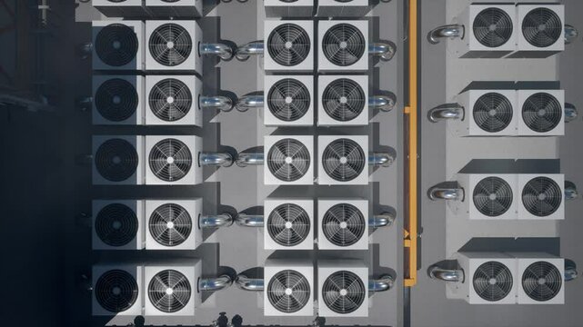 Array of HVAC Units on a Rooftop of a Modern Building