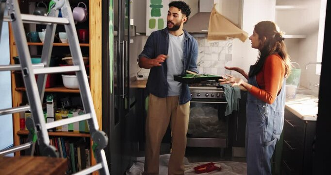 Home, argument and couple with renovation, conversation and fighting in kitchen. People, apartment and man with woman, property interior or disagreement with discussion, angry and conflict with paint