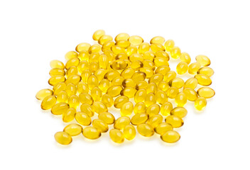 Vitamin D Softgel Capsules Spilled from Brown Glass Bottle on White Isolated Background – Dietary Supplement for Health