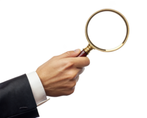 hand holding magnifying glass on transparent background