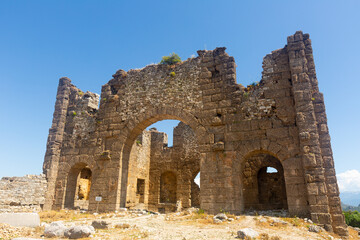 Stone ruins of eastern section of basilica in ancient Greco-Roman city of Aspendos in Antalya...