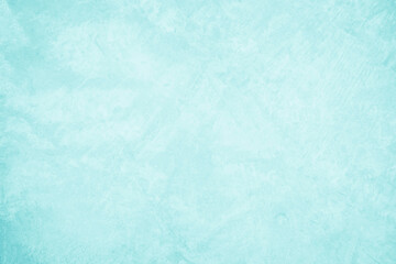 Pastel blue and white concrete stone texture for background in summer wallpaper. Cement and sand wall of tone vintage. Concrete abstract wall of light cyan color, cement texture mint green for design.