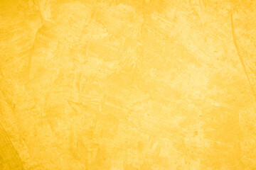 Concrete abstract wall of light yellow color, cement texture white blank for home decor.