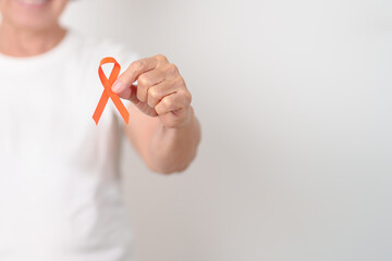 Elderly with Orange Ribbon for Leukemia, Kidney cancer day, Multiple Sclerosis, Self Injury Awareness month, Hunger action, Complex Regional Pain Syndrome, Gun Violence, Agent Orange, Work Zone safety
