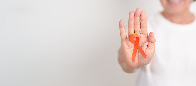 Elderly with Orange Ribbon for Leukemia, Kidney cancer day, Multiple Sclerosis, Self Injury Awareness month, Hunger action, Complex Regional Pain Syndrome, Gun Violence, Agent Orange, Work Zone safety