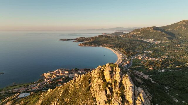 Aerial View of Corsican Village and Sandy Bay at Sunset