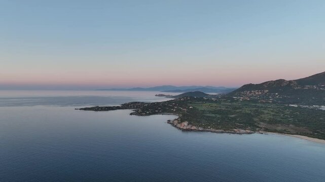 Serene Twilight Over French Island Coast with Rolling Hills and Ocean Horizon