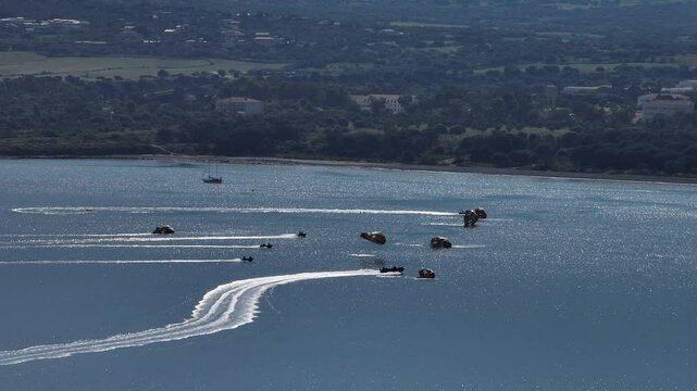 Military Parachute Drop Recovery Operations on Water with Speedboats