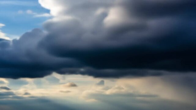Dynamic time-lapse of fast-moving clouds sweeping across the sky, showcasing the beauty of nature's constant motion. Ideal for background scenes, weather-related content, environmental videos, and rel
