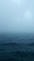Fototapeta premium Misty marine expanse, evocative oceanic horizon landscape photograph