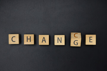 Change Word Made of Wooden Letter Blocks