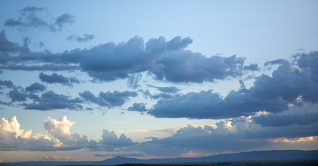 Clouds in Wyoming sunset on prairie