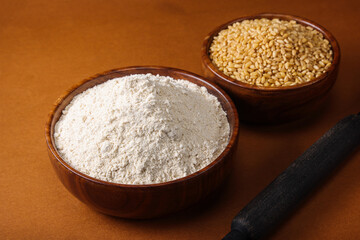Whole Wheat Atta isolated on dark background
