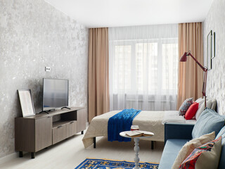 interior design. interior photography of an apartment for rent. One-room apartment with a simple...