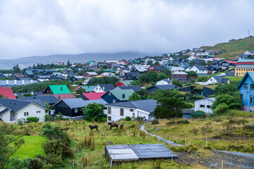 Foggy and overcast weather over Tórshavn, the capital of the Faroe Islands in northern Europe