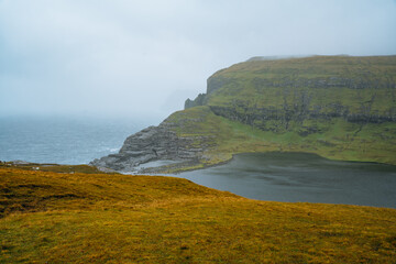 The lake above the ocean Sorvagsvatn on cliffs in the Faroe Islands, Vagar Island