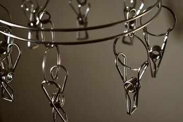 Metal clothespins for drying clothes indoors.	